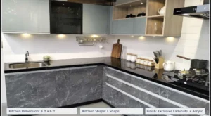Compact L-shaped modular kitchen with acrylic laminate finish, smart storage cabinets, black countertop, and modern appliances by Nishan Interio – Contact for Custom Kitchen and Wardrobes in Uttarakhand