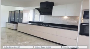 Modern straight modular kitchen with PU finish, handleless cabinets, black countertop, built-in appliances, and sleek contemporary design – Contact for Custom Kitchen and Wardrobes in Uttarakhand