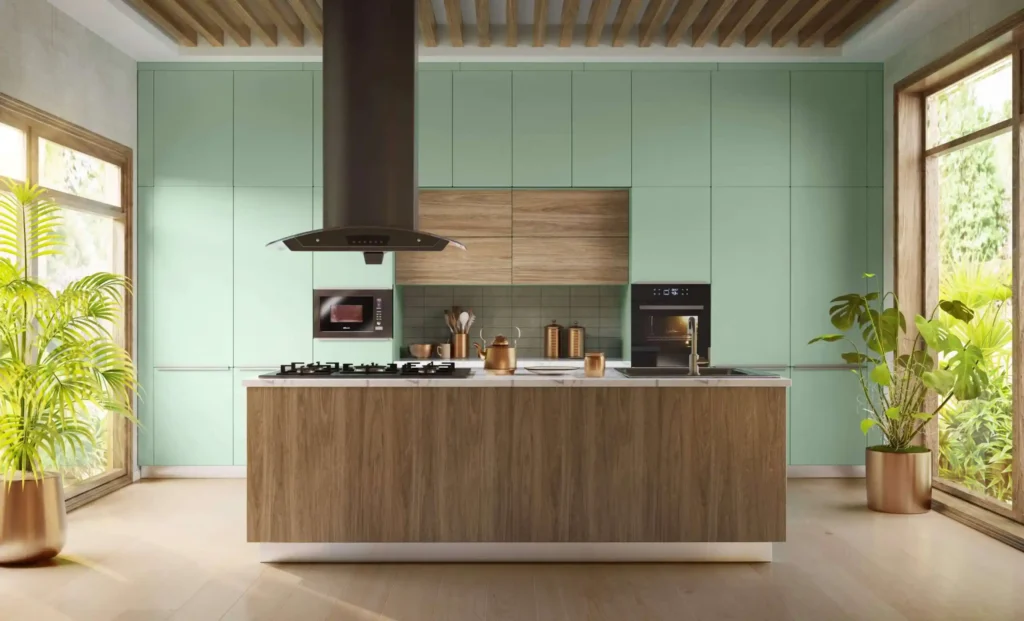 Contemporary modular kitchen with central island, soft pastel cabinetry, natural lighting, and premium finishes designed by Nishan Interio – Best Modular Kitchen in Uttarakhand
